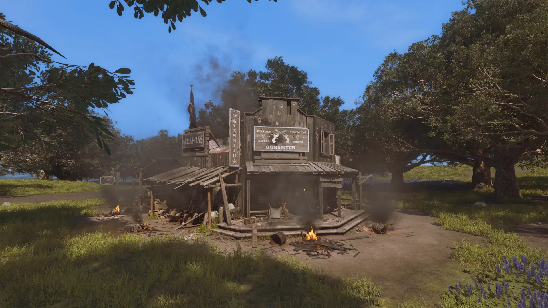 A frontier gunsmith burning after a failed outpost defense, smoke rising through the oaks and wreckage scattered across the yard.