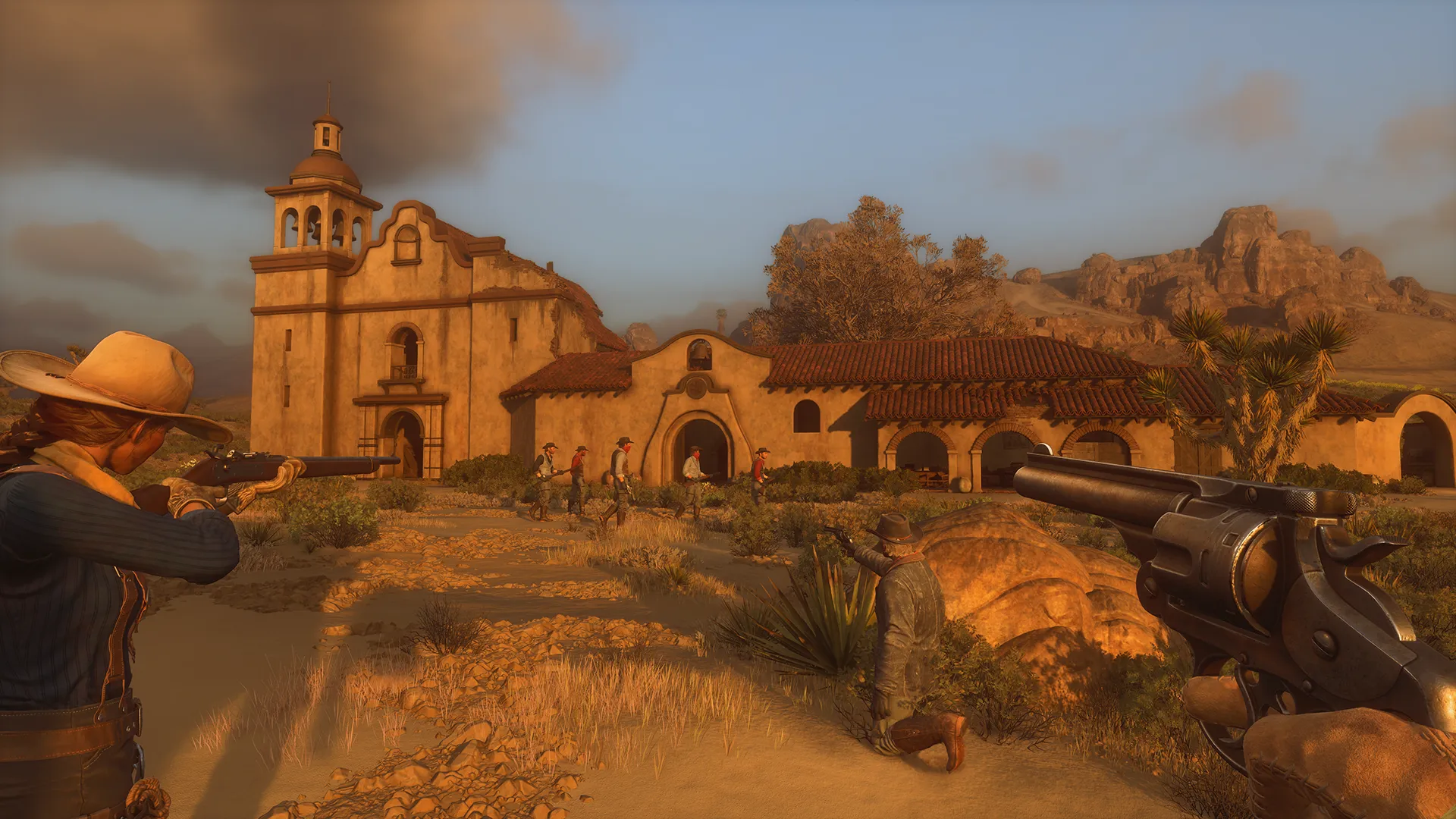 A mission building lit by low evening sun.